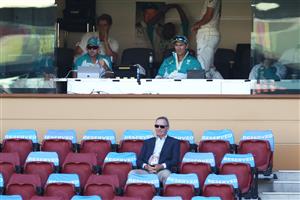 ADELAIDE, AUSTRALIA - DECEMBER 18: Australian Chairman of Selectors, Trevor Hohns, sits in front of Justin Langer, coach of Australia and the Australian dressing rooms during day two of the First Test match between Australia and India at Adelaide Oval on December 18, 2020 in Adelaide, Australia. (Photo by Ryan Pierse/Getty Images)