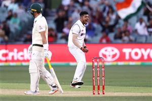 ADELAIDE, AUSTRALIA - DECEMBER 18: Umesh Yadav of India celebrates taking the wicket of Marnus Labuschagne of Australia during day two of the First Test match between Australia and India at Adelaide Oval on December 18, 2020 in Adelaide, Australia. (Photo by Ryan Pierse/Getty Images)