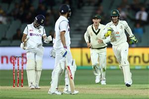 ADELAIDE, AUSTRALIA - DECEMBER 17: Tim Paine of Australia celebrates the run-out of Virat Kohli of India during day one of the First Test match between Australia and India at Adelaide Oval on December 17, 2020 in Adelaide, Australia. (Photo by Cameron Spencer/Getty Images)