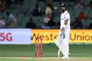 ADELAIDE, AUSTRALIA - DECEMBER 17: Virat Kohli of India reacts after being run-out during day one of the First Test match between Australia and India at Adelaide Oval on December 17, 2020 in Adelaide, Australia. (Photo by Ryan Pierse/Getty Images)