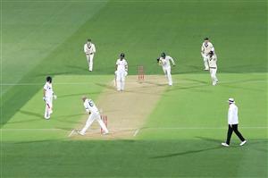 ADELAIDE, AUSTRALIA - DECEMBER 17: Nathan Lyon of Australia and Josh Hazlewood of Australia run out Virat Kohli of India during day one of the First Test match between Australia and India at Adelaide Oval on December 17, 2020 in Adelaide, Australia. (Photo by Cameron Spencer/Getty Images)