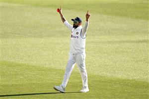 ADELAIDE, AUSTRALIA - DECEMBER 18: Virat Kohli of India celebrates taking the catch to dismiss Cameron Green of Australia during day two of the First Test match between Australia and India at Adelaide Oval on December 18, 2020 in Adelaide, Australia. (Photo by Ryan Pierse/Getty Images)