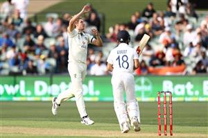 ADELAIDE, AUSTRALIA - DECEMBER 17: Cameron Green of Australia reacts after a delivery to Virat Kohli of India during day one of the First Test match between Australia and India at Adelaide Oval on December 17, 2020 in Adelaide, Australia. (Photo by Ryan Pierse/Getty Images)