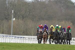 ASCOT, ENGLAND - DECEMBER 19: Harry Cobden riding Mister Malarky (3L, purple) on their way to winning The Good Luck Hollie In SPOTY Silver Cup Handicap Chase at Ascot Racecourse on December 19, 2020 in Ascot, England. Owners are allowed to attend if they have a runner at the meeting otherwise racing remains behind closed doors to the public due to the Coronavirus pandemic. (Photo by Alan Crowhurst/Getty Images)