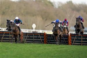 ASCOT, ENGLAND - DECEMBER 19: Aidan Coleman riding Paisley Park (R, spotted cap) clear the last to win The Porsche Long Walk Hurdle from Richard Johnson and Thyme Hill (L, white cap) at Ascot Racecourse on December 19, 2020 in Ascot, England. Owners are allowed to attend if they have a runner at the meeting otherwise racing remains behind closed doors to the public due to the Coronavirus pandemic. (Photo by Alan Crowhurst/Getty Images)