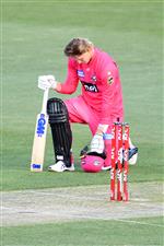 HOBART, AUSTRALIA - DECEMBER 20: Jack Edwards of the Sixers takes a knee during the Big Bash League match between the Sydney Sixers and the Adelaide Strikers at Blundstone Arena, on December 20, 2020, in Hobart, Australia. (Photo by Steve Bell/Getty Images)