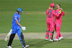 HOBART, AUSTRALIA - DECEMBER 20: Steve O'Keefe of the Sixers celebrates taking the wicket of Matt Short of the Strikers during the Big Bash League match between the Sydney Sixers and the Adelaide Strikers at Blundstone Arena, on December 20, 2020, in Hobart, Australia. (Photo by Steve Bell/Getty Images)