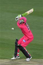 HOBART, AUSTRALIA - DECEMBER 20: Daniel Hughes of the Sixers is struck by a delivery during the Big Bash League match between the Sydney Sixers and the Adelaide Strikers at Blundstone Arena, on December 20, 2020, in Hobart, Australia. (Photo by Steve Bell/Getty Images)
