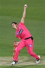 HOBART, AUSTRALIA - DECEMBER 20: Ben Dwarshuis of the Sixers bowls during the Big Bash League match between the Sydney Sixers and the Adelaide Strikers at Blundstone Arena, on December 20, 2020, in Hobart, Australia. (Photo by Steve Bell/Getty Images)