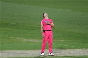 HOBART, AUSTRALIA - DECEMBER 20: Ben Dwarshuis of the Sixers reacts during the Big Bash League match between the Sydney Sixers and the Adelaide Strikers at Blundstone Arena, on December 20, 2020, in Hobart, Australia. (Photo by Steve Bell/Getty Images)