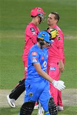 HOBART, AUSTRALIA - DECEMBER 20: Steve O'Keefe of the Sixers celebrates taking the wicket of Matt Short of the Strikers during the Big Bash League match between the Sydney Sixers and the Adelaide Strikers at Blundstone Arena, on December 20, 2020, in Hobart, Australia. (Photo by Steve Bell/Getty Images)