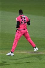 HOBART, AUSTRALIA - DECEMBER 20: Carlos Brathwaite of the Sixers celebrates the wicket of Alex Carey of the Strikers during the Big Bash League match between the Sydney Sixers and the Adelaide Strikers at Blundstone Arena, on December 20, 2020, in Hobart, Australia. (Photo by Steve Bell/Getty Images)