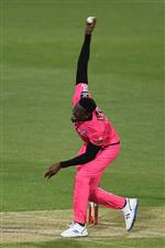 HOBART, AUSTRALIA - DECEMBER 20: Carlos Brathwaite of the Sixers comes in to bowl during the Big Bash League match between the Sydney Sixers and the Adelaide Strikers at Blundstone Arena, on December 20, 2020, in Hobart, Australia. (Photo by Steve Bell/Getty Images)
