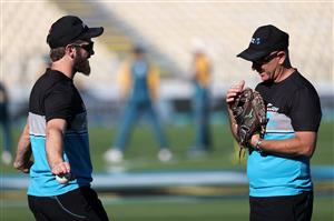 HAMILTON, NEW ZEALAND - DECEMBER 20: Kane Williamson, captain of New Zealand (L) and Black Caps coach Gary Stead warm up during game two of the International T20 series between New Zealand and Pakistan at Seddon Park on December 20, 2020 in Hamilton, New Zealand. (Photo by Fiona Goodall/Getty Images)