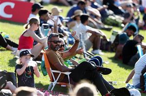 HAMILTON, NEW ZEALAND - DECEMBER 20: Fans enjoy the sun ahead of game two of the International T20 series between New Zealand and Pakistan at Seddon Park on December 20, 2020 in Hamilton, New Zealand. (Photo by Fiona Goodall/Getty Images)