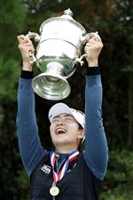 HOUSTON, TEXAS - DECEMBER 14: A Lim Kim of Korea celebrates with the trophy after winning the 75th U.S. Women's Open Championship at Champions Golf Club Cypress Creek Course on December 14, 2020 in Houston, Texas. (Photo by Jamie Squire/Getty Images)