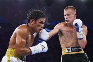 SYDNEY, AUSTRALIA - DECEMBER 16: Liam Wilson and Rodynie Rafol compete during the Undercard fight prior to the light-middleweight World Title elimination bout between Tim Tszyu and Bowyn Morgan at Bankwest Stadium on December 16, 2020 in Sydney, Australia. (Photo by Brett Hemmings/Getty Images)
