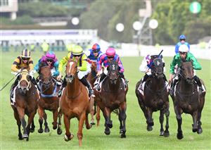 MELBOURNE, AUSTRALIA - DECEMBER 19: Damian Lane riding Sword of Mercy to win Race 9, the G.h. Mumm Christmas Plate, during Melbourne Racing at Flemington Racecourse on December 19, 2020 in Melbourne, Australia. (Photo by Vince Caligiuri/Getty Images)