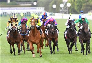 MELBOURNE, AUSTRALIA - DECEMBER 19: Damian Lane riding Sword of Mercy to win Race 9, the G.h. Mumm Christmas Plate, during Melbourne Racing at Flemington Racecourse on December 19, 2020 in Melbourne, Australia. (Photo by Vince Caligiuri/Getty Images)