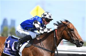 MELBOURNE, AUSTRALIA - DECEMBER 19: Jamie Kah riding Lunakorn to win race 6, the Merry Christmas Vrc Members Plate, during Melbourne Racing at Flemington Racecourse on December 19, 2020 in Melbourne, Australia. (Photo by Vince Caligiuri/Getty Images)