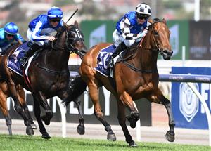 MELBOURNE, AUSTRALIA - DECEMBER 19: Jamie Kah riding Lunakorn to win race 6, the Merry Christmas Vrc Members Plate, during Melbourne Racing at Flemington Racecourse on December 19, 2020 in Melbourne, Australia. (Photo by Vince Caligiuri/Getty Images)