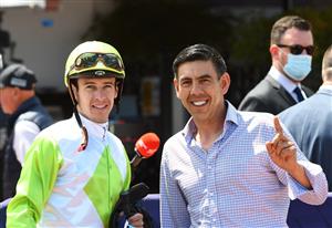 MELBOURNE, AUSTRALIA - DECEMBER 19: Jockey Jordan Childs poses with Trainer Peter Gelagotis after riding Long Arm to win Race 4, the Lovethehorse Trophy, during Melbourne Racing at Flemington Racecourse on December 19, 2020 in Melbourne, Australia. (Photo by Vince Caligiuri/Getty Images)