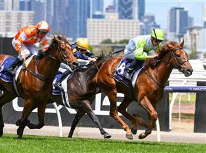 MELBOURNE, AUSTRALIA - DECEMBER 19: Jockey Jordan Childs riding Long Arm to win Race 4, the Lovethehorse Trophy, during Melbourne Racing at Flemington Racecourse on December 19, 2020 in Melbourne, Australia. (Photo by Vince Caligiuri/Getty Images)