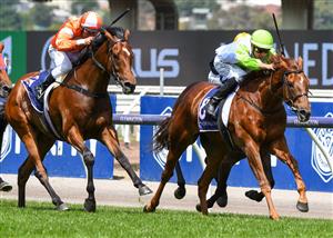 MELBOURNE, AUSTRALIA - DECEMBER 19: Jockey Jordan Childs riding Long Arm to win Race 4, the Lovethehorse Trophy, during Melbourne Racing at Flemington Racecourse on December 19, 2020 in Melbourne, Australia. (Photo by Vince Caligiuri/Getty Images)