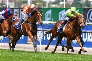 MELBOURNE, AUSTRALIA - DECEMBER 19: Jockey Jordan Childs riding Long Arm to win Race 4, the Lovethehorse Trophy, during Melbourne Racing at Flemington Racecourse on December 19, 2020 in Melbourne, Australia. (Photo by Vince Caligiuri/Getty Images)