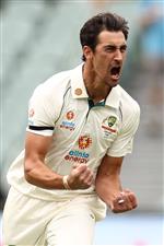 ADELAIDE, AUSTRALIA - DECEMBER 17: Mitchell Starc of Australia celebrates after taking the wicket of Prithvi Shaw of India for a duck during day one of the First Test match between Australia and India at Adelaide Oval on December 17, 2020 in Adelaide, Australia. (Photo by Ryan Pierse/Getty Images)