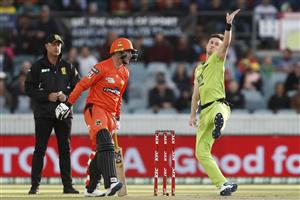 CANBERRA, AUSTRALIA - DECEMBER 22: Adam Milne of the Thunder slips as he bowls during the Big Bash League match between the Sydney Thunder and the Perth Scorchers at Manuka Oval, on December 22, 2020, in Canberra, Australia. (Photo by Darrian Traynor/Getty Images)