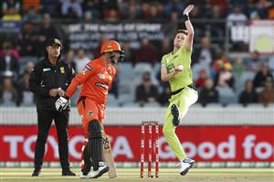 CANBERRA, AUSTRALIA - DECEMBER 22: Adam Milne of the Thunder slips as he bowls during the Big Bash League match between the Sydney Thunder and the Perth Scorchers at Manuka Oval, on December 22, 2020, in Canberra, Australia. (Photo by Darrian Traynor/Getty Images)