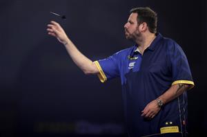 LONDON, ENGLAND - DECEMBER 22: Adrian Lewis of England in action during his second round match Danny Baggish of The Unites States during day eight of the PDC William Hill World Darts Championship at Alexandra Palace on December 22, 2020 in London, England. (Photo by Luke Walker/Getty Images)