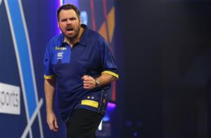 LONDON, ENGLAND - DECEMBER 22: Adrian Lewis of England in reacts during his second round match Danny Baggish of The United States during day eight of the PDC William Hill World Darts Championship at Alexandra Palace on December 22, 2020 in London, England. (Photo by Luke Walker/Getty Images)