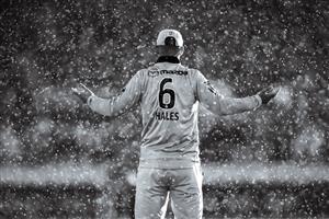 CANBERRA, AUSTRALIA - DECEMBER 22: (EDITORS NOTE: Image has been converted to black and white.) Alex Hales of the Thunder asks the umpires about the rain during the Big Bash League match between the Sydney Thunder and the Perth Scorchers at Manuka Oval, on December 22, 2020, in Canberra, Australia. (Photo by Darrian Traynor/Getty Images)