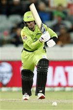 CANBERRA, AUSTRALIA - DECEMBER 22: First gamer Oliver Davies of the Thunder bats during the Big Bash League match between the Sydney Thunder and the Perth Scorchers at Manuka Oval, on December 22, 2020, in Canberra, Australia. (Photo by Darrian Traynor/Getty Images)