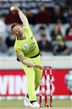 CANBERRA, AUSTRALIA - DECEMBER 22: Daniel Sams of the Thunder bowls during the Big Bash League match between the Sydney Thunder and the Perth Scorchers at Manuka Oval, on December 22, 2020, in Canberra, Australia. (Photo by Darrian Traynor/Getty Images)