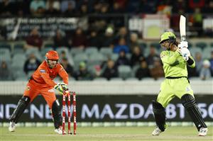 CANBERRA, AUSTRALIA - DECEMBER 22: First gamer Oliver Davies of the Thunder is stumped by Josh Inglis of the Scorches during the Big Bash League match between the Sydney Thunder and the Perth Scorchers at Manuka Oval, on December 22, 2020, in Canberra, Australia. (Photo by Darrian Traynor/Getty Images)