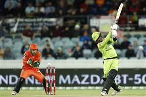 CANBERRA, AUSTRALIA - DECEMBER 22: First gamer Oliver Davies of the Thunder is stumped by Josh Inglis of the Scorches during the Big Bash League match between the Sydney Thunder and the Perth Scorchers at Manuka Oval, on December 22, 2020, in Canberra, Australia. (Photo by Darrian Traynor/Getty Images)