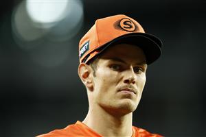 CANBERRA, AUSTRALIA - DECEMBER 22: Aaron Hardie of the Scorchers fields on the boundary during the Big Bash League match between the Sydney Thunder and the Perth Scorchers at Manuka Oval, on December 22, 2020, in Canberra, Australia. (Photo by Darrian Traynor/Getty Images)