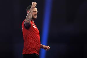 LONDON, ENGLAND - DECEMBER 22: Joe Cullen of England reacts during his second round match against Wayne Jones of England during day eight of the PDC William Hill World Darts Championship at Alexandra Palace on December 22, 2020 in London, England. (Photo by Luke Walker/Getty Images)
