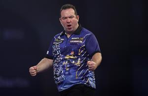 LONDON, ENGLAND - DECEMBER 22: Brendan Dolan of Northern Ireland reacts during his second round match against Edward Foulkes of Japan during day eight of the PDC William Hill World Darts Championship at Alexandra Palace on December 22, 2020 in London, England. (Photo by Luke Walker/Getty Images)