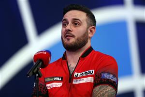 LONDON, ENGLAND - DECEMBER 22: Joe Cullen of England talks to the media during his second round match against Wayne Jones of England during day eight of the PDC William Hill World Darts Championship at Alexandra Palace on December 22, 2020 in London, England. (Photo by Luke Walker/Getty Images)