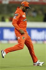 CANBERRA, AUSTRALIA - DECEMBER 22: Fawad Ahmed of the Scorchers avoids touching the ball after it was hit into the crowd during the Big Bash League match between the Sydney Thunder and the Perth Scorchers at Manuka Oval, on December 22, 2020, in Canberra, Australia. (Photo by Darrian Traynor/Getty Images)