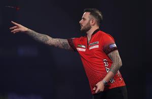 LONDON, ENGLAND - DECEMBER 22: Joe Cullen of England in action during his second round match against Wayne Jones of England during day eight of the PDC William Hill World Darts Championship at Alexandra Palace on December 22, 2020 in London, England. (Photo by Luke Walker/Getty Images)