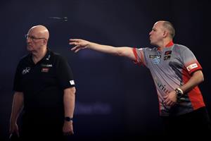 LONDON, ENGLAND - DECEMBER 22: Darius Labanauskas of Lithuania in action during his second round match against Simon Whitlock of Australia during day eight of the PDC William Hill World Darts Championship at Alexandra Palace on December 22, 2020 in London, England. (Photo by Luke Walker/Getty Images)