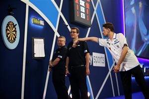 LONDON, ENGLAND - DECEMBER 22: Edward Foulkes of Japan in action during his second round match against Brendan Dolan of Northern Ireland during day eight of the PDC William Hill World Darts Championship at Alexandra Palace on December 22, 2020 in London, England. (Photo by Luke Walker/Getty Images)