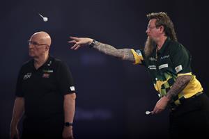 LONDON, ENGLAND - DECEMBER 22: Simon Whitlock of Australia in action during his second round match against Darius Labanauskas of Lithuania during day eight of the PDC William Hill World Darts Championship at Alexandra Palace on December 22, 2020 in London, England. (Photo by Luke Walker/Getty Images)