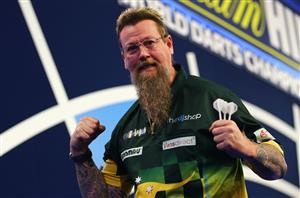 LONDON, ENGLAND - DECEMBER 22: Simon Whitlock of Australia reacts on during his second round match against Darius Labanauskas of Lithuania during day eight of the PDC William Hill World Darts Championship at Alexandra Palace on December 22, 2020 in London, England. (Photo by Luke Walker/Getty Images)