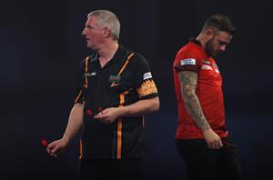 LONDON, ENGLAND - DECEMBER 22: Wayne Jones of England in action during his second round match against Joe Cullen of England during day eight of the PDC William Hill World Darts Championship at Alexandra Palace on December 22, 2020 in London, England. (Photo by Luke Walker/Getty Images)